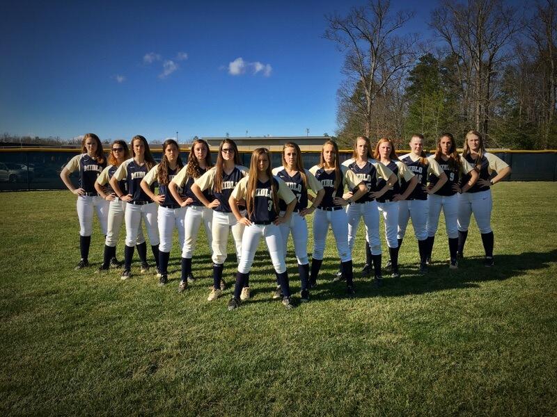 The Softball team lines up in an intimidating v-shaped formation.