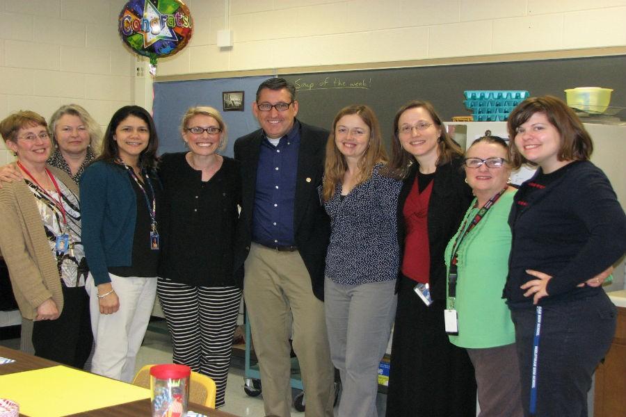 Members of Midlos World Language Department congratulate Mr. Rob Gifford on his honor.