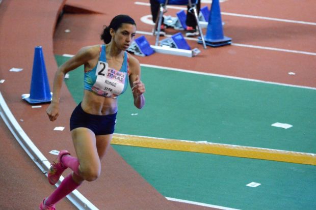 Runge sprints around the track in the 400m prelims