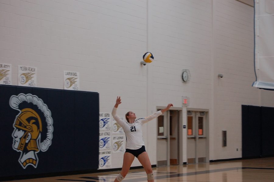 Rachel Trebor winds up to pound the serve against Powhatan