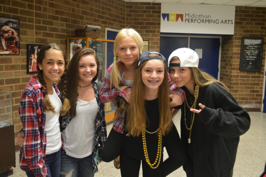 On Tour Tuesday:  Sophia Nadder, Sydney Sowers, Chloe Kochensparger, Mckenna Fecht, and Courtney Klich show off their school spirit with gold chains and flannel shirts. 