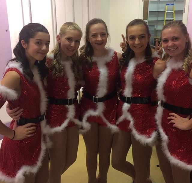 Emily Palmer, Ashlyn Kelly, Mollie Jones, Moriah Stanley, and Megan Harrell prepare for the opening of the show. 