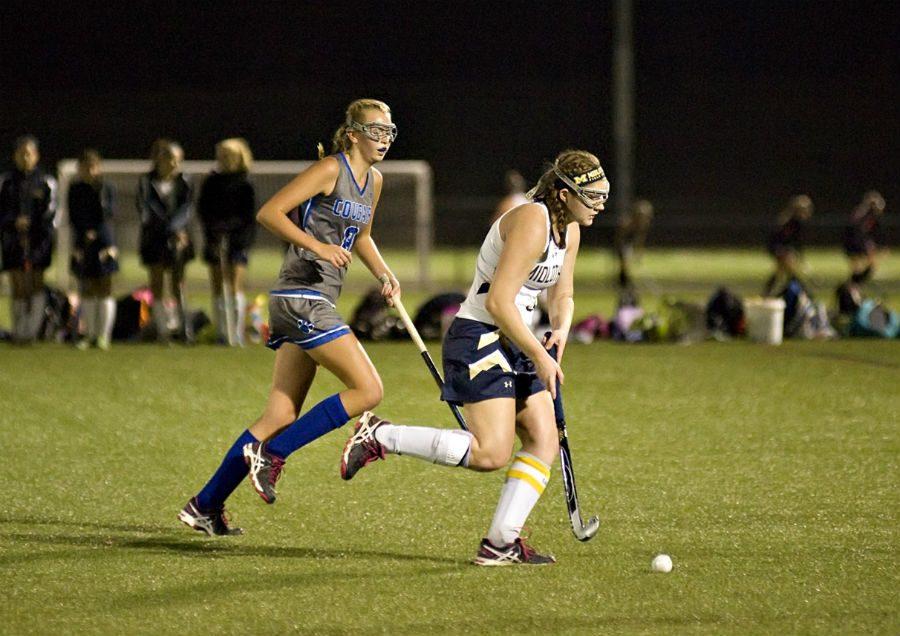 Nora Mulroy scans the end of the field and prepares to pass up to one of her forward players. 