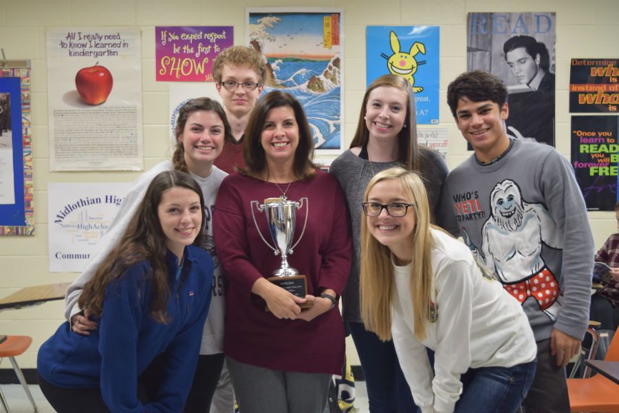 Mrs. Tully shares her Teachers Recognizing Teachers award with her AP English students.
