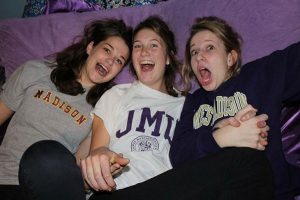 Students celebrate over their JMU acceptance. 
