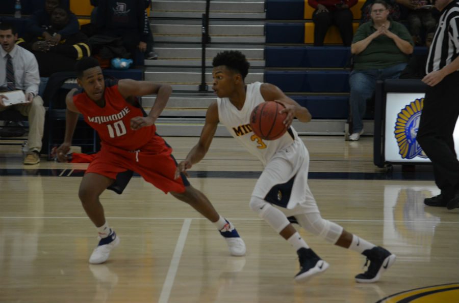 Rico Coleman looks to drive to the basket.