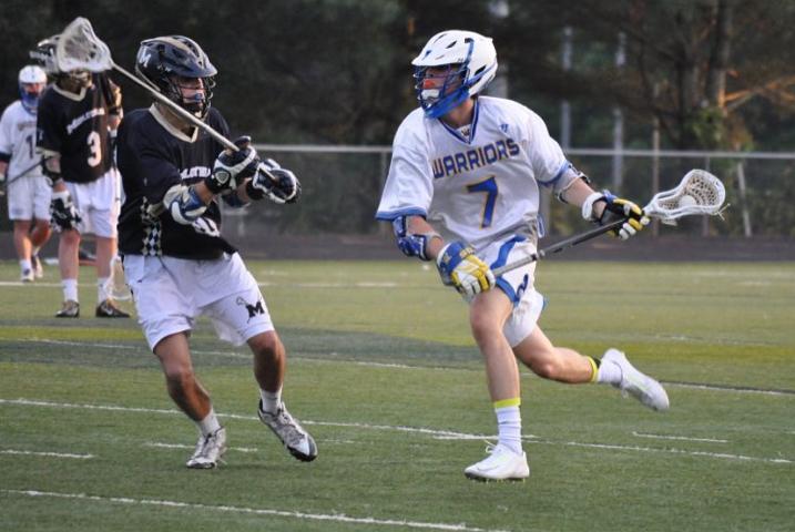 Junior D1 VMI lacrosse commit, David Foster, defends a Western Albemarle offender. 