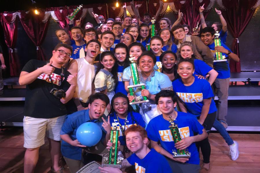 Just For Show shows off their trophies that they won at the Hampton Roads Show Choir Invitational.