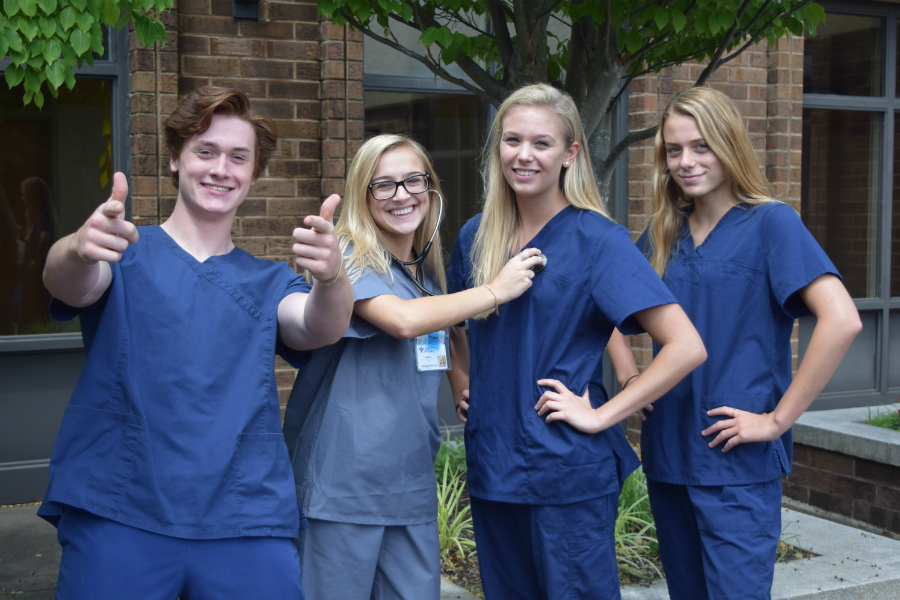 Coleman Rock, Kate Hicks, Caroline Majetic, and Olivia Coleman showed off their scrubs on Dream Job Tuesday.