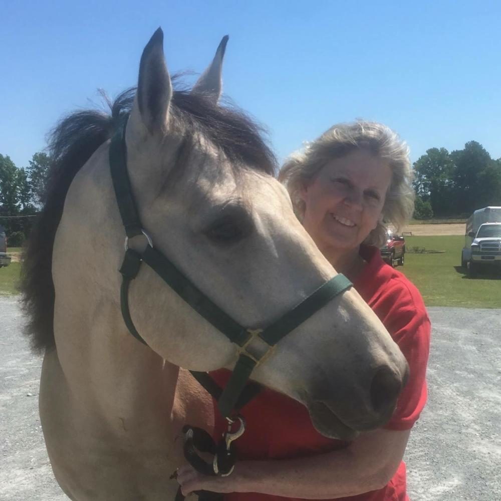 Ms. Boyd and Stetson enjoy the sunshine.