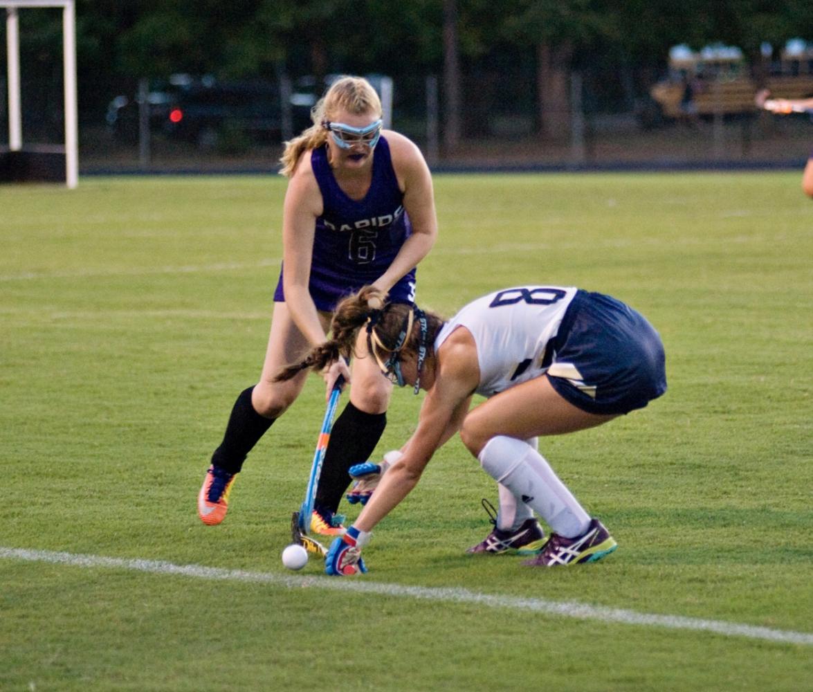 Isabella Mcnulty gets low and blocks the ball.