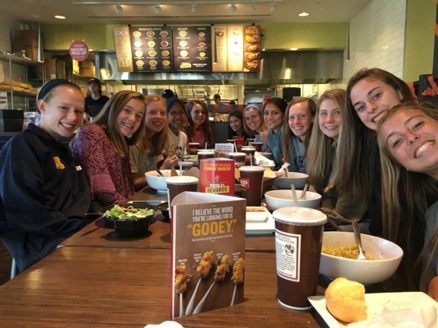 Midlo Girls XC enjoy dinner together on the eve of the Great American Cross Country Festival in Cary, NC.