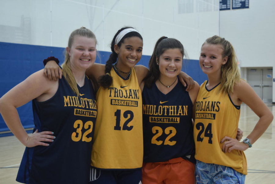 Morgan Gilbert, Alexis Kelley, Eleanor Ross, and Irish Kulas prepare to work hard at practice.