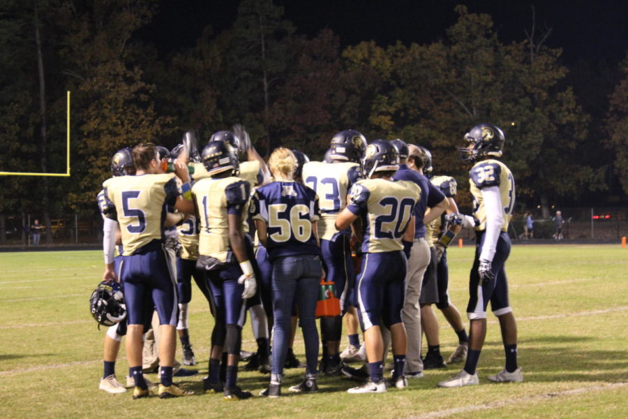 Midlos starting offensive unit gathers in preparation for the big game ahead of them. 