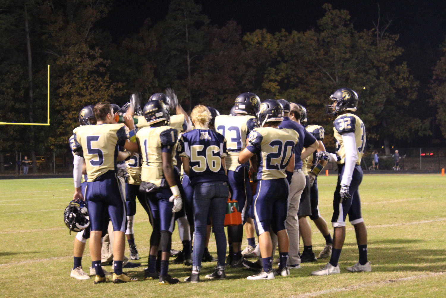 Midlo's starting offensive unit gathers in preparation for the big game ahead of them.