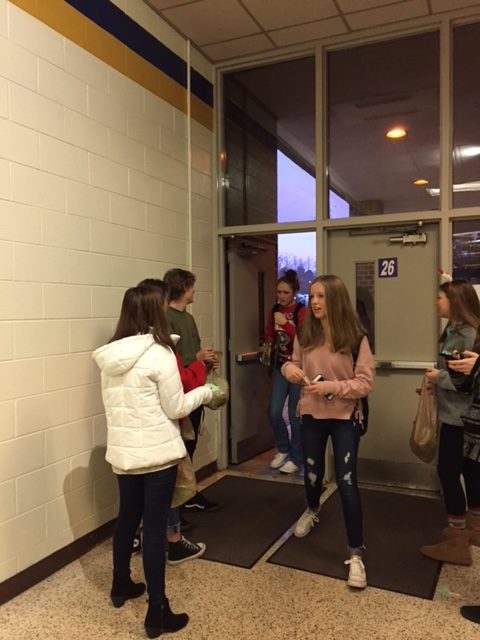 Trojans for Tomorrow club members distribute Kindness Kanes on the first day of exams.