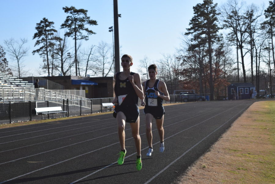 Andrew Steenkamer competes with a L.C. Bird runner. 