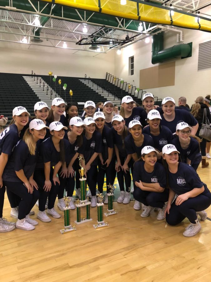 Midlo Dance Team wins grand champion award at the Clover Hill competition.