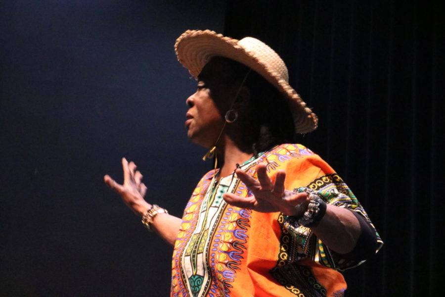 Charmaine Crowell-White illustrates an African origin myth before an audience of Midlothian students.