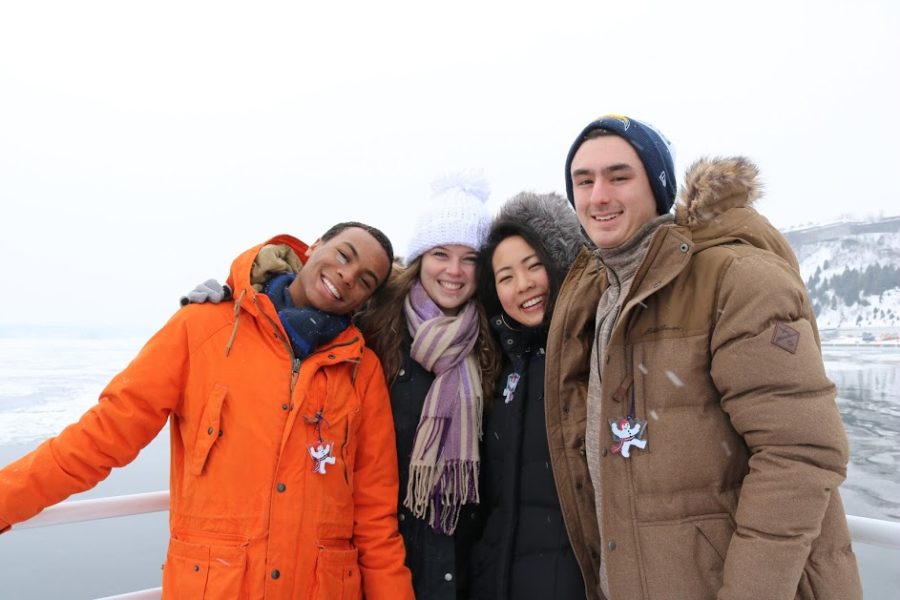 Seniors BJ Beckwith, Claire OBrien, Joy Li, and Max Turkaly, take a ferry ride to cross the frozen St. Lawrence River.