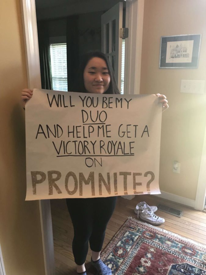 Christina Ju proposes to Jason Li by incorporating his love for Fortnite onto a poster.