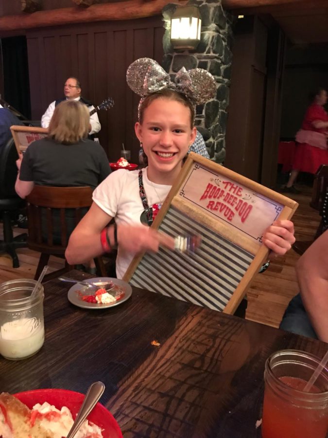 Lena Caffall bangs on a washboard in the Hoop-Dee-Doo Revue dinner in Orlando.