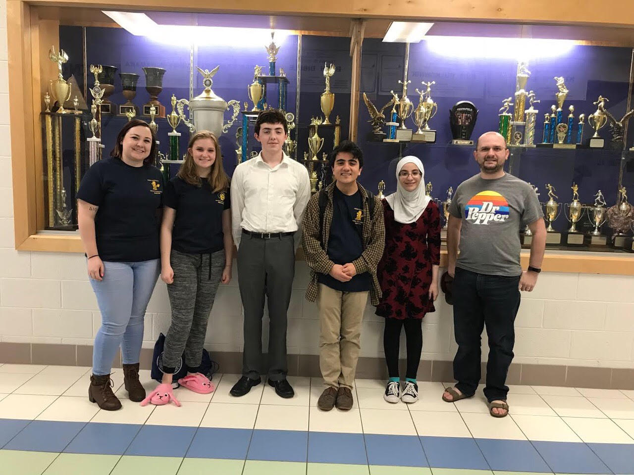 From left; Ms. Megan Rebman, Courtney Galligher, Quentin Phillips(third from left), Vincent Mangano , Nour Goulmamine, and Mr. Daniel Cheatham. Midlo Forensics competed at King George High School for the Super Regionals. Quentin Phillips went on to win a silver medals at the state competition.