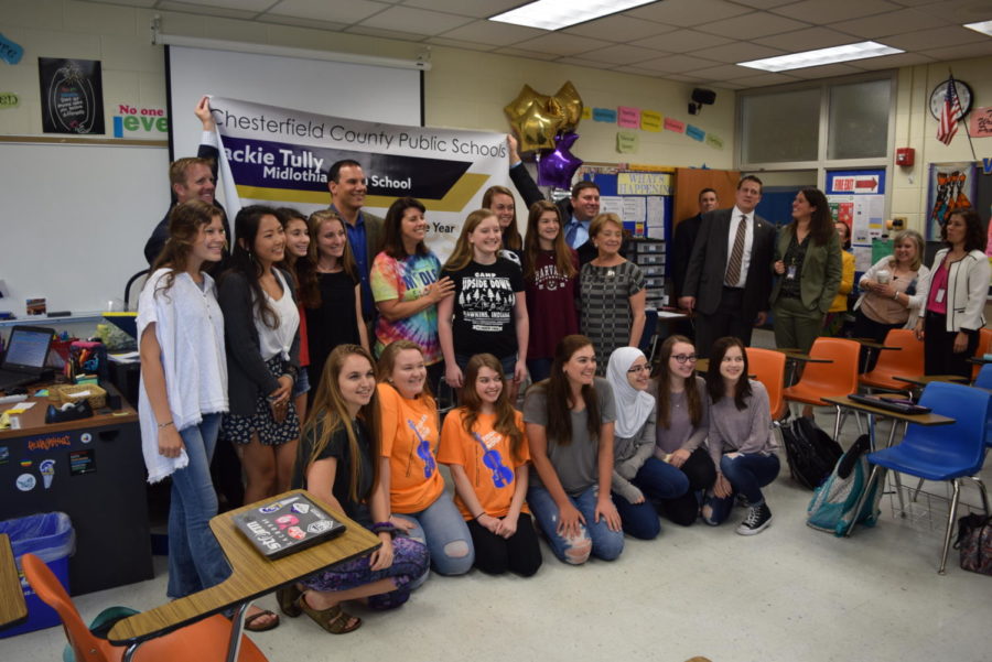 Chesterfield County employees travel to Mrs. Tullys classroom at Midlothian High School to surprise her with her recognition of CCPS High School Teacher of the Year.