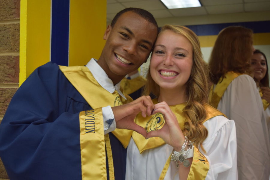 BJ Beckwith and Eva Johnson show their love of the Class of 2018.