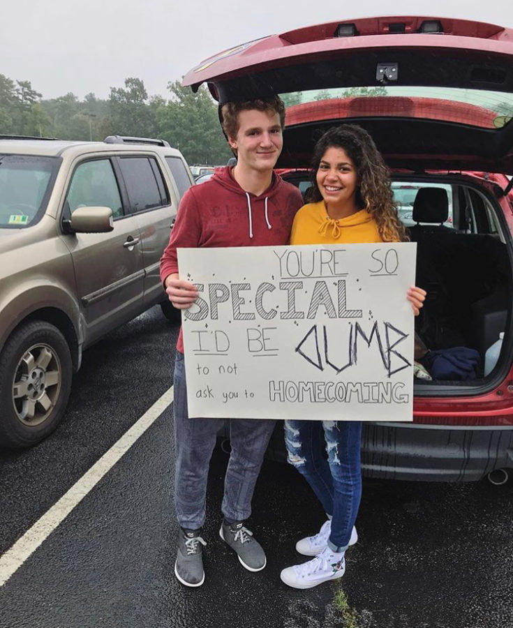 Senior Evan Fournet asked his girlfriend Alessandra Taliaferro with a poster in the student parking lot. 