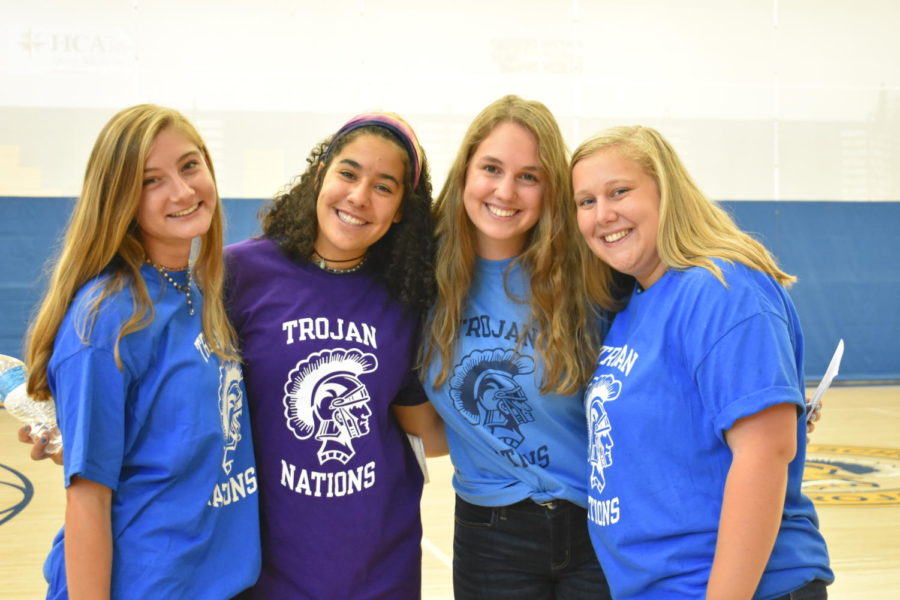 Trojan Nations Sidekicks, Lilly Hayes, Samantha Boero, Sydney Constantino, and Sydney Johnson, prepare to meet their freshmen at the Midlo freshman orientation. 