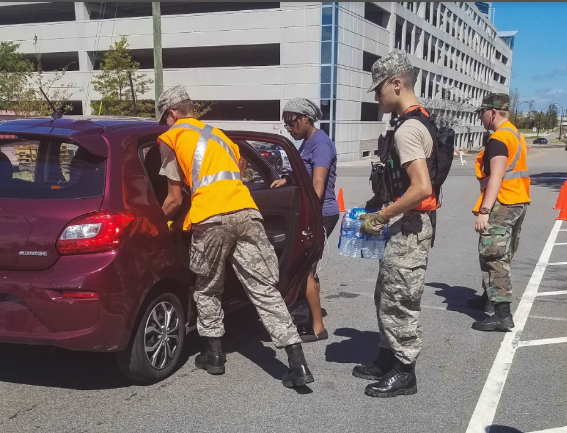 Freshman Connor Long works hard with his fellow cadets in Wilmington, North Carolina to help those impacted by Hurricane Florence.