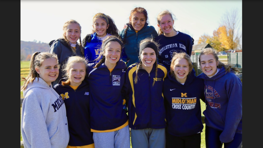 The Midlo XC Girls celebrate their fourth place finish at the VHSL State Championships in Warrenton, VA.