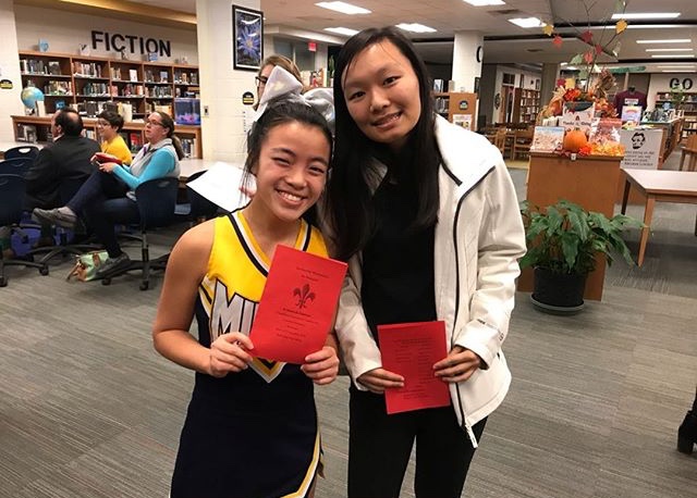 Chloe Naughton and Sherinne Zhang celebrate their induction into the French Honor Society. 