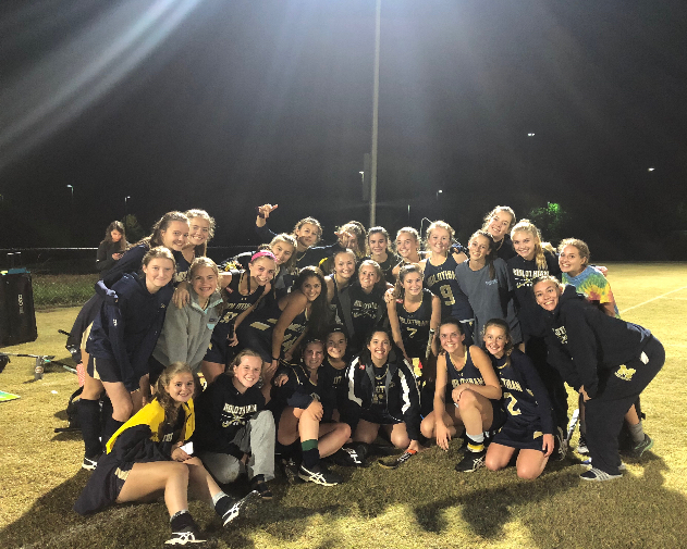 Midlo Field Hockey celebrates a 1-0 win over Powhatan.