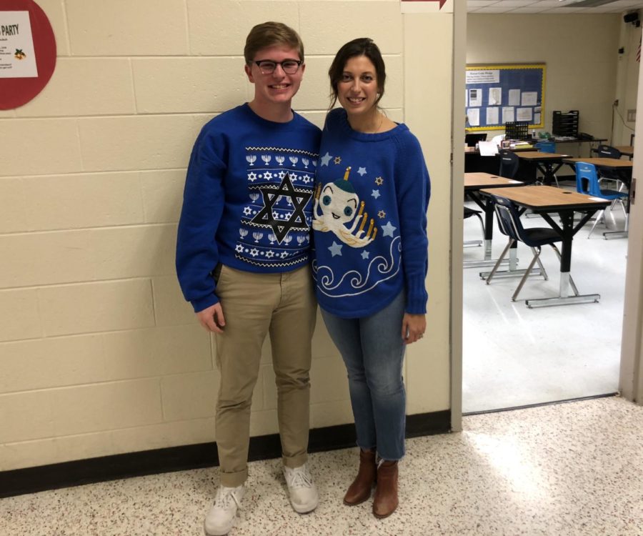 Brent+Novey+and+Mrs.+Aiello+show+off+their+festive++Hanukkah+sweaters.