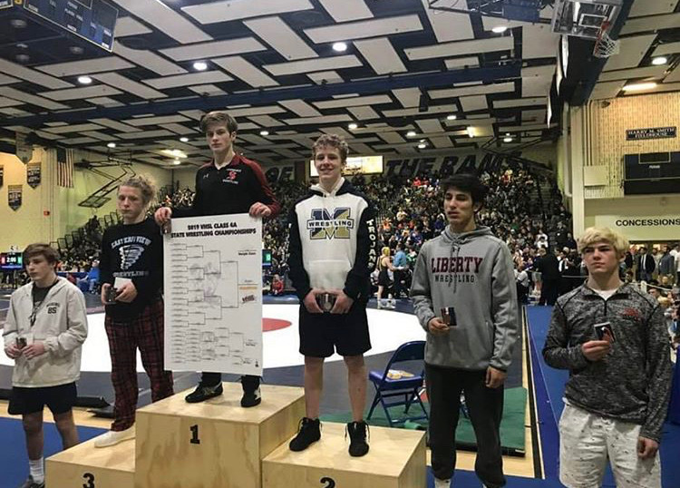 Junior John Bolstad takes second place for weight class 132 at the 2019 States Wrestling Tournament.