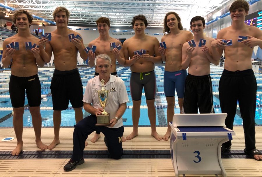 Star MIdlo swimmers show off their medals as they take on 2019 Regionals for the win.