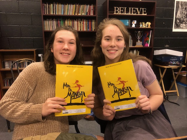 Coleen Maloney and Pauline Spencer prepare to read-through the script at the first rehearsal for Man of La Mancha.