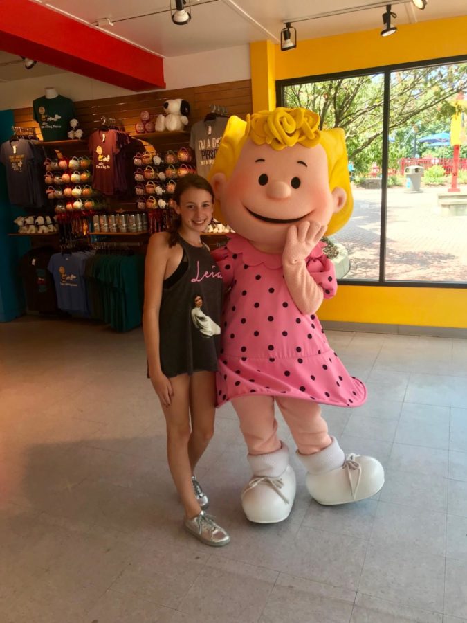 Nicole Rizzo enjoys her day at Kings Dominion with the character Sally Brown, who she portrayed in the school play, Youre a Good Man, Charlie Brown.