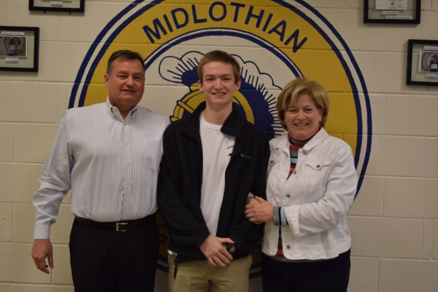 Michael Rowes family congratulates him on receiving the Student of the Year.
