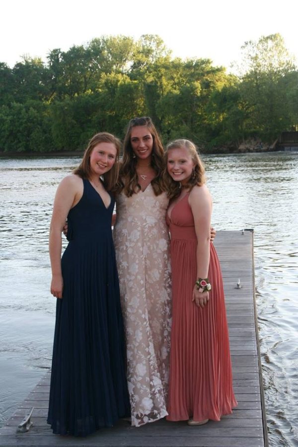 Seniors Maggie McDermott, Abby White, and Madison McCallum take advantage of a beautiful evening before prom begins.