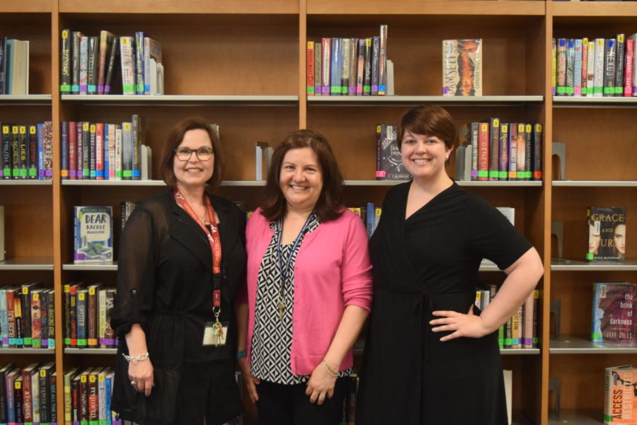 The Midlothian library staff welcomes Mrs. Elizabeth Cequeria (center) to the team. 