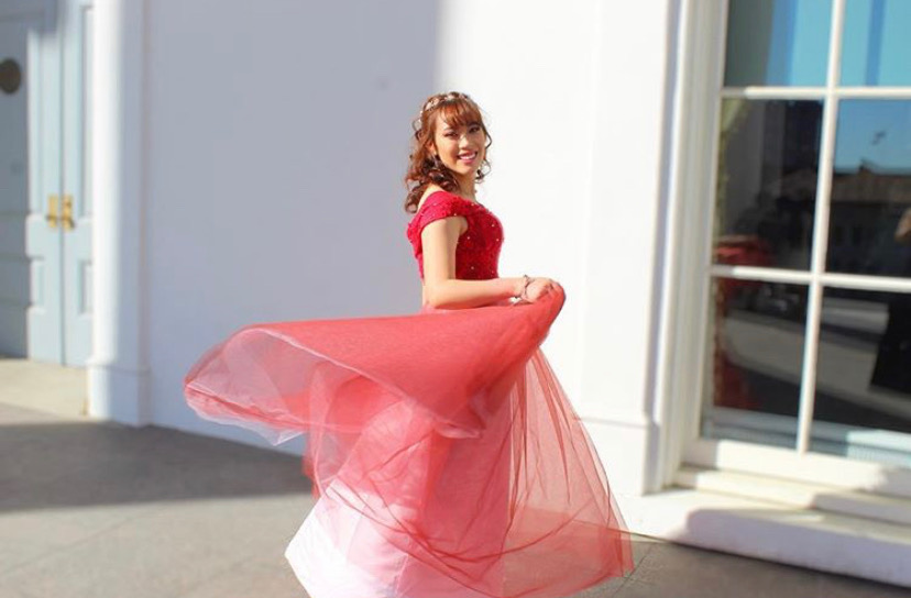 Amanda Chok twirls in her prom dress outside the Virginia Capitol.