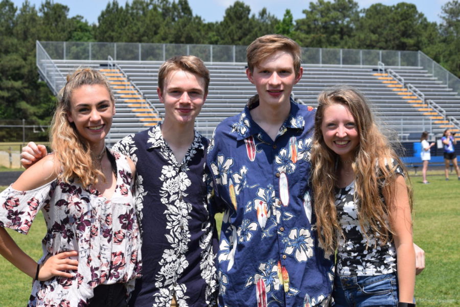 Kelsey Seiler, Ben Wrobel, Jacob Marshall, and Abbey Lynch celebrate at the 2019 SCA Picnic.