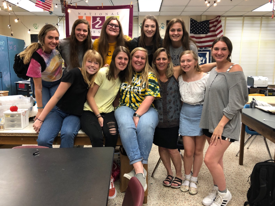 Mrs. OKleaskys seniors wave farewell to high school. 