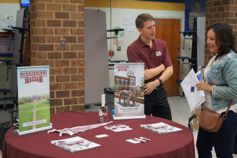 The Mississippi State college representative discusses the benefits of his school with parents of Midlo students.