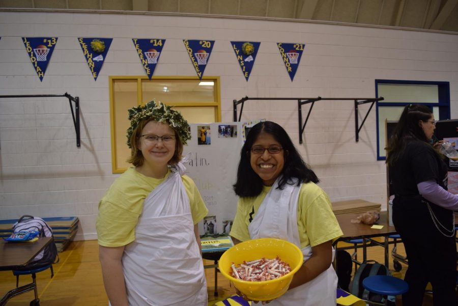 Midlos Latin Club members go all out in togas for the Club Fair.