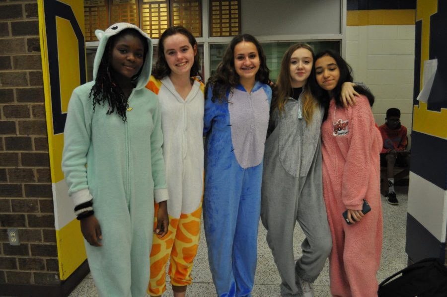 Midlo students wear cozy onesies, each representing different animals, during Homecoming Spirit Week 2019. 