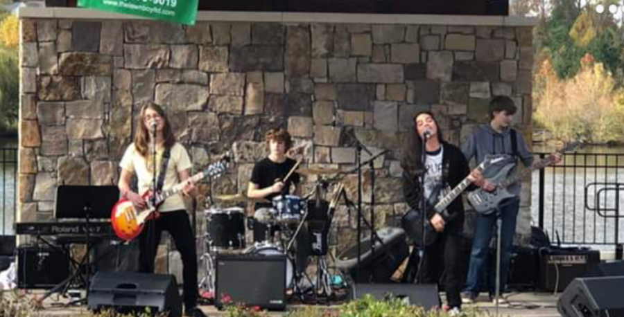 The local rock band Highrise perform live at the Jack Ryan Music Festival.